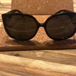 Burberry sunglasses . See etched serial number.